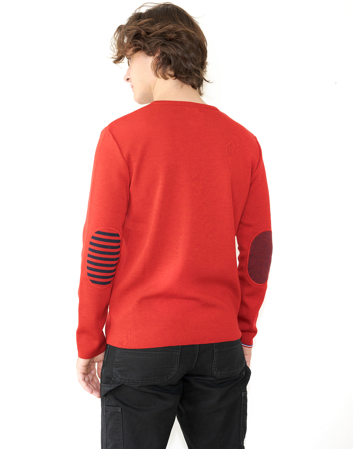 Men's V-neck sweater in red merino with asymmetrical navy blue stripes